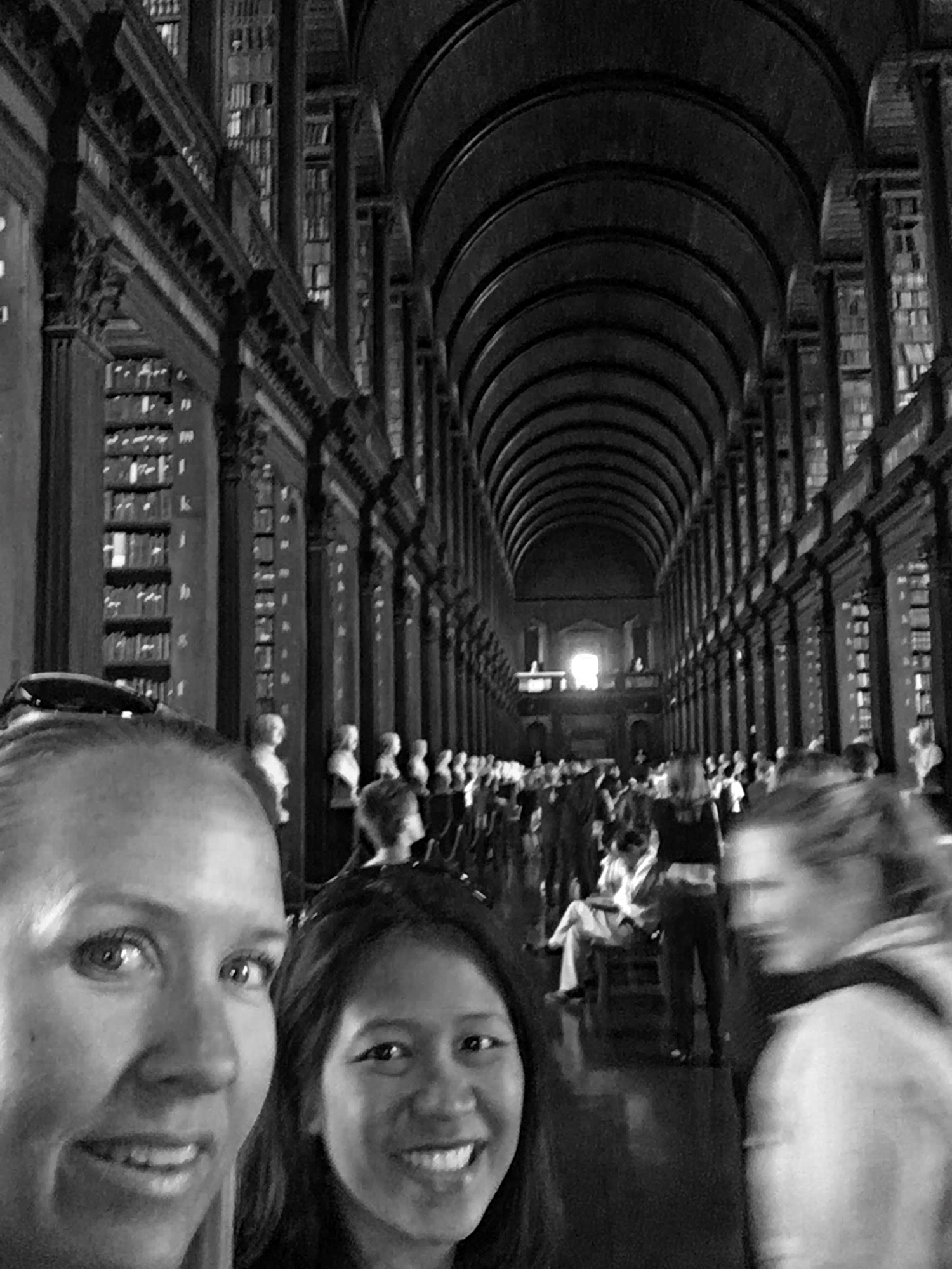 Mrs. Alt and her best friend in the long library at Trinity college